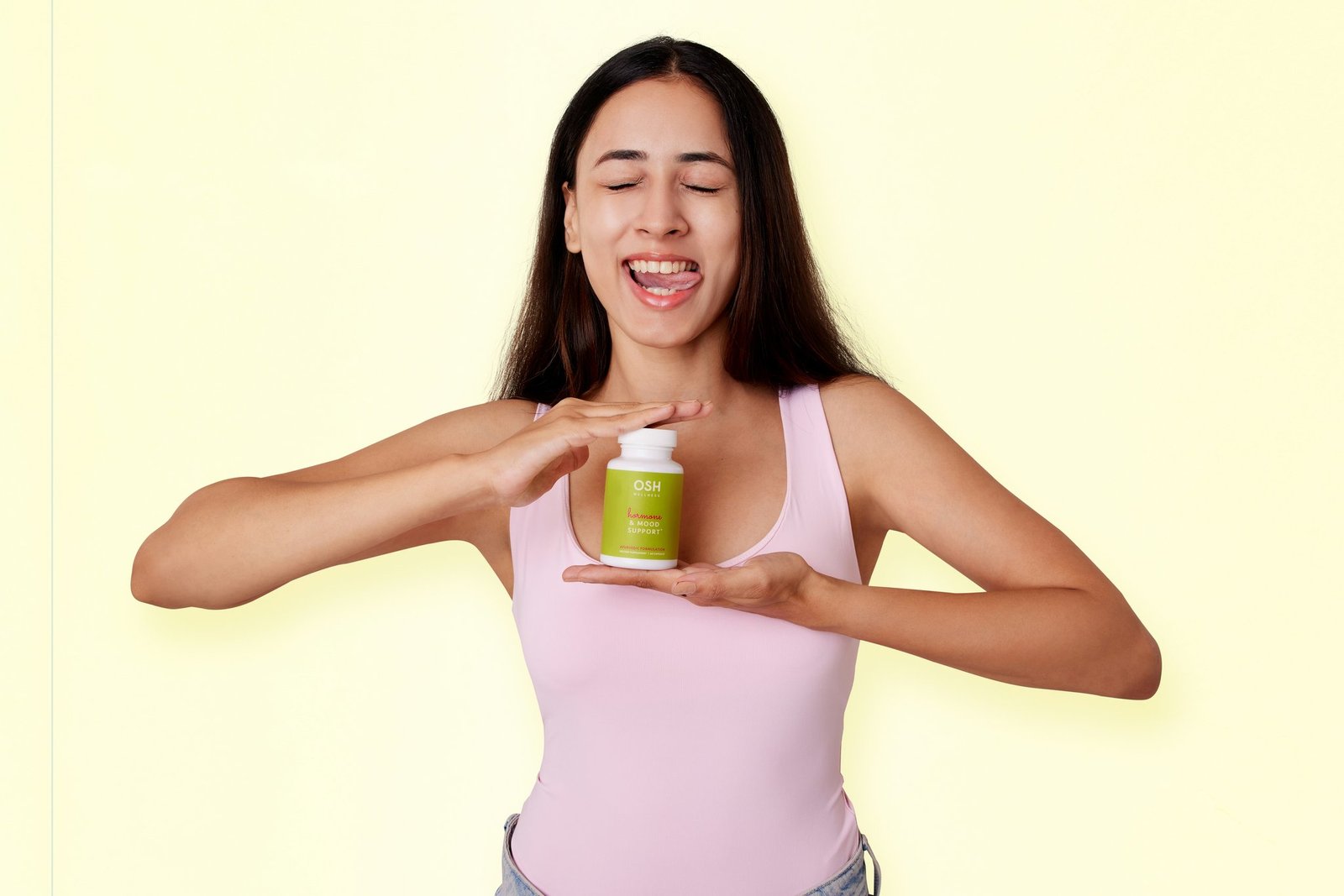 A steaming cup of red clover tea brewed with fresh leaves