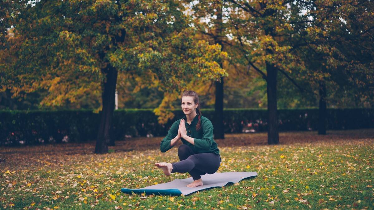 Smiling woman enjoying newfound vitality through red clover