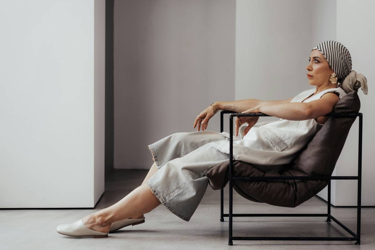 Two women smiling while drinking tea, representing success stories with red clover